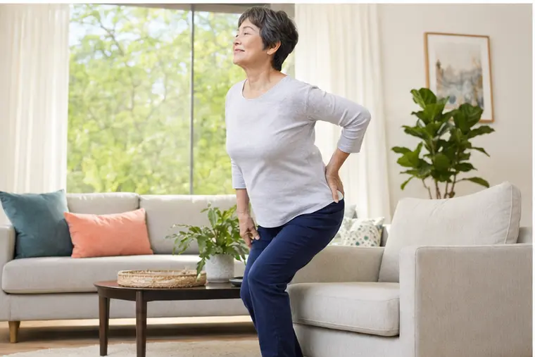 Woman feeling tight after sitting
