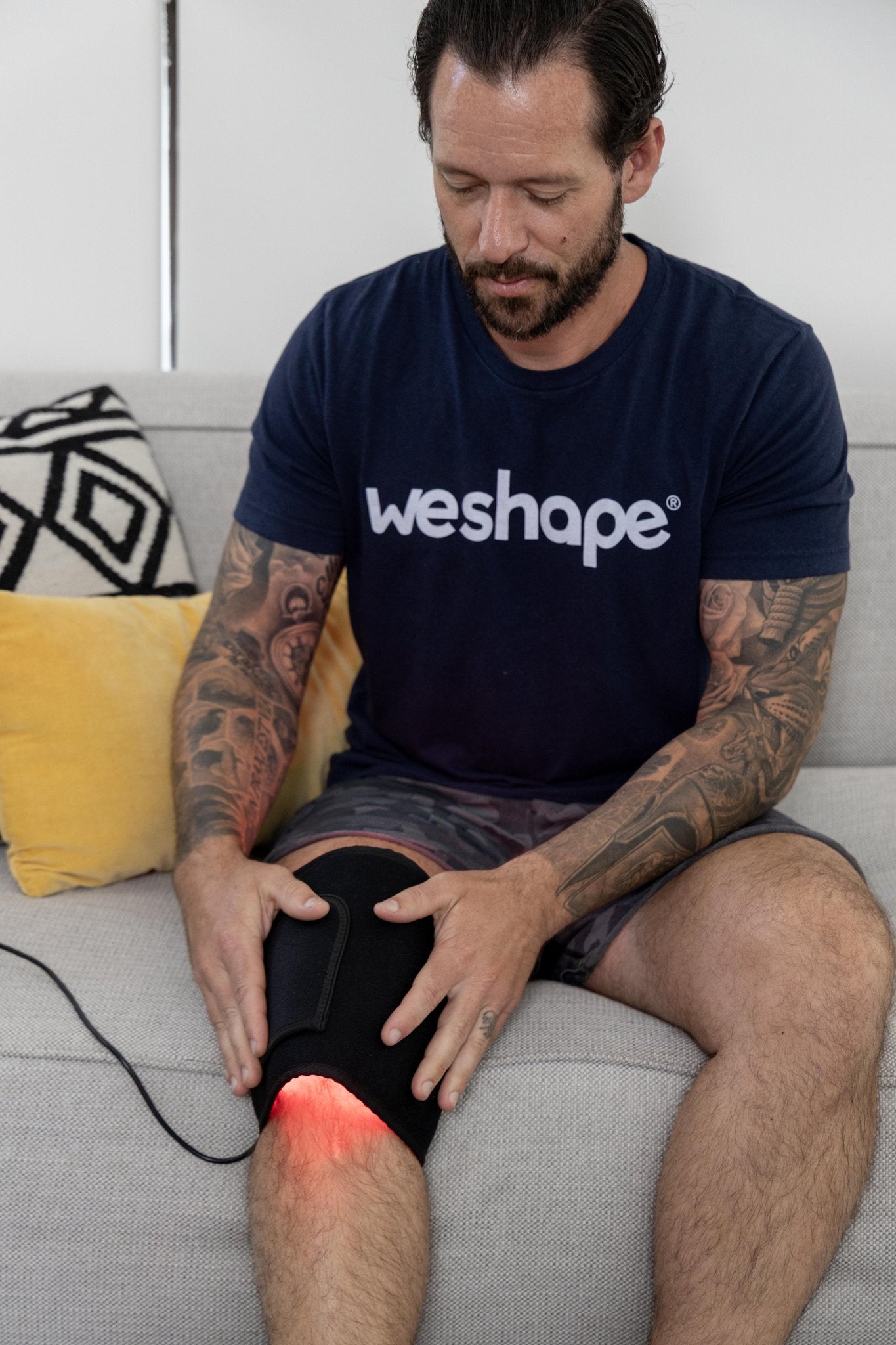 Tyler Using WeRelieve on leg